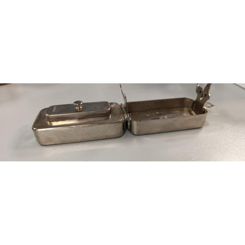 chauffe fer à friser à huile utilisé comme stérilisateur pendant 2 GM
