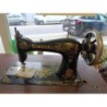 machine à coudre ancienne Singer sur pied en fonte